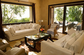 The living room with door to veranda